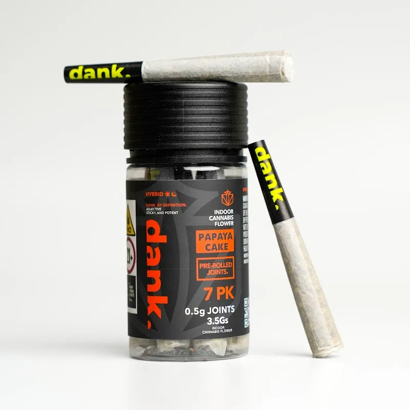 Pre-rolled joints jar with joint leaning, cannabis product photography