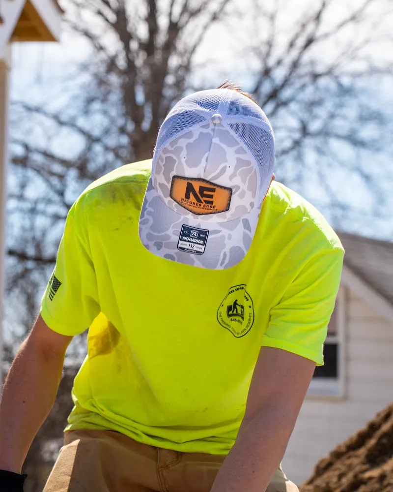 Crew member in hi-vis at work, construction photography Hudson Valley